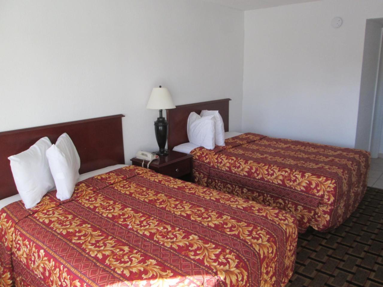 Budget Inn كوكاو المظهر الخارجي الصورة